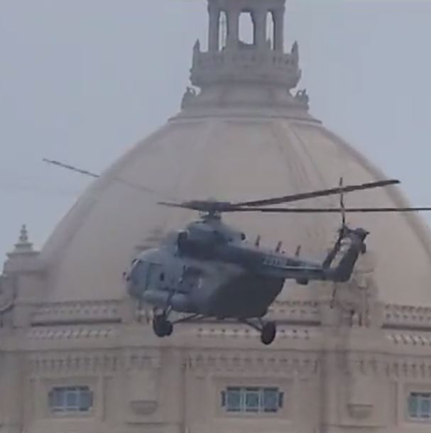 Suddenly a helicopter was seen hovering over the assembly.